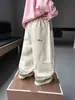 Pantalones a cuadros para niño de primavera y otoño con dobladillo enrollado bordado, estilo coreano elegantes y holgados casuales para niños, pantalones de bebé, comercio exterior