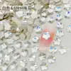 Blanco boutique de fondo plano con forma especial taladro para uñas taladro K9 imitación Hua Zi no se cae el fondo mini tamaño pequeño decoraciones para uñas al por mayor