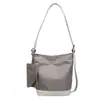 Bolsa estilo preguiçoso feminina 2026 nova bolsa de lona moda casual para trabalho deslocamento bolsa de ombro única bolsa transversal tipo balde