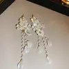 Pendientes de Borla de Flor de Hada Súper Pendientes de Lujo Ligero de Gama Alta Diseño de Nicho Temperamento de Hada Suave Joyería para Orejas Venta al por Mayor
