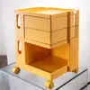 Venta al por mayor de fábrica tipo ensamblaje en stock estilo nórdico simple tipo cajón gabinete de almacenamiento para el hogar puede girar y desmontar multicolor