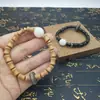 Pulsera de Cuentas de Sándalo Buda, Círculo Único de Cuentas de Bambú, Pulsera de Rosario Wenwan Jiejie Gaosheng, Joyería al por Mayor de Puesto Callejero y Lugar Turístico