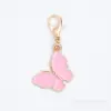 Colgante de historieta rosa con goteo de aceite, colgante de aleación en tono rosa, accesorios para manualidades, llavero decorativo, accesorios al por mayor