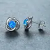 Comercio electrónico transfronterizo más vendido aretes de oro rosa de cuatro garras azules Aobao con diseño de espiral aretes de moda lindos joyería simple de personalidad