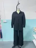 Conjunto de dos piezas para mujer de Amazon transfronterizo europeo y americano, cárdigan de color liso con botones, manga larga, pantalones de pierna ancha, traje casual de primavera y otoño, nuevo
