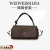 Bolso tejido estilo coreano de nicho hecho a mano para baguette para mujer, nuevo modelo de verano 2026, estilo diario con cierre, adecuado para ir al trabajo, bolso de hombro y cruzado