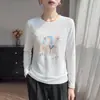 2026 Nuevo Estilo Casual Cuello Redondo Estampado Manga Larga Tejido para Mujer Versátil Cardigan Protector Solar Temperamento Rejuvenecedor