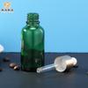 Fábrica en stock 10 ml 15 ml 30 ml botella de aceite esencial marrón con cabezal de goma, botella pequeña de aceite esencial de vidrio, botella de aceite esencial