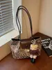Bolsa de Gran Capacidad para Viajes Diarios Mujer 2025 Nuevo Otoño/Invierno Estampado de Leopardo Estudiante Universitario Bolso de Mano Tote Bolso Cruzado Hombro Único