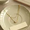 Collar de doble capa de nácar con baño de oro real de 18k para mujer, cadena para clavícula de lujo ligero y de alta gama, accesorio exquisito y versátil