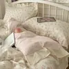 Juego de cuatro piezas floral 100% algodón Clase A, ropa de cama de algodón lavado, funda de edredón de encaje estilo coreano, funda de edredón y sábana de algodón puro