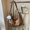 Bolso retro de gran capacidad, nuevo para mujer, multifuncional, mochila simple, bandolera versátil de moda para el día a día