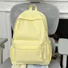 Mochila feminina estudante universitária versão coreana ins grande capacidade simples cor sólida mochila para estudante do ensino fundamental e médio para meninos e meninas
