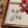 Elegantes simples versátiles tacones altos aretes de perla gris moda para mujer Año Nuevo diseño nicho aretes accesorios