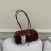 Bolsa baguette estilo coreano com laço, bolsa de ombro única para axila para mulheres, nova moda 2025, versátil, bolsa Boston, bolsa de bowling