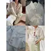 Recomendación PrincipalCamisa Larga de Manga Larga Oversize Yuran 26 Estilo Nuevo de Principios de Primavera Bloque de Color Lino Botón de Hongo Diseño de Doble Bolsillo