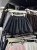 Falda corta de línea A floral anti-exposición de nuevo estilo para primavera y otoño 2026 para mujeres petite, falda midi entalladora de cintura alta