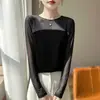 Nuevo top de moda de primavera para mujer con cuello redondo, holgado y elegante, camiseta básica de manga larga con inserciones de malla 2026, elegante