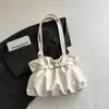 Bolso de hombro retro de color sólido 2026, alta estética, nuevo diseño de moda, elegante y moderno, adecuado para ir al trabajo, con correa de hombro plisada