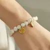 Pulsera de perlas naturales de agua dulce europea y americana, acero inoxidable chapado en oro de 18k, exquisito conjunto de pulseras de joyería de lujo ligero para mujer al por mayor
