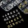 Joyería para Uñas de 12 Compartimentos Transfronteriza Nueva Joyería Navideña Aleación Copo de Nieve Alce Mixto Diamante para Uñas DIY