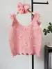 Suéter sin mangas de estilo dulce y suave con capas, adornado con abalorios pesados, lazo y bordes con volantes, chaleco de punto para mujer