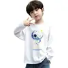 Camiseta de manga larga para niño, moderna y elegante, 100% algodón, primavera/otoño 2026, camiseta básica con estampado de dibujos animados estilo coreano para niños