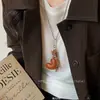 Collar Colgante de Flor con Cuerda de Cera y Cuentas de Madera Estilo Étnico Temperamento Retro Cadena para Clavícula Nicho Lujo Ligero Joyería de Gama Alta para Mujeres