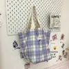 Otoño 2026 nuevo bolso de hombro a cuadros diseño coreano para mujer retro versátil para ir al trabajo bolsa de mano de gran capacidad