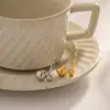 Anillo Geométrico Silencioso Europeo y Americano de Acero Inoxidable Oro 18K Tamaño Dorado Anillo de Bola Joyería Versátil de Acero Inoxidable Venta al por Mayor