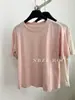 Camiseta de manga corta de color liso con diseño dividido, estilo verano 2024/Corea del Sur, para mujer, fina, sencilla, holgada, top tee