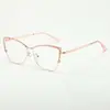 Nuevas gafas versátiles estilo europeo y americano anti-luz azul con pedrería, montura de metal, moda femenina ojo de gato personalidad de moda gafas sin graduación