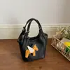 Bolso Cubo Estampado de Dibujos Animados para Mujer 2026 Nueva Moda Bolso de Hombro Cruzado Bolso de Mano Informal Ropa de Trabajo Bolso de Cuadros