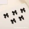 Jóias de unha de arco explosivo resina tridimensional pequeno arco diy decoração de unhas acessórios Joker atacado