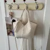 Bolso de textura tejida de nicho para mujer 2026 nuevo estilo moda para ir al trabajo bandolera bolso de mano bolso cubo