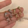 Pendientes Exquisitos de Serpiente Xiao Ling Benmingnian para Mujer 2025 Nuevos Pendientes de Serpiente Populares Lujo Ligero Alta Gama Pendientes del Zodíaco