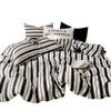 Venta al por mayor de ropa de cama de algodón bohemio de cuatro piezas, estilo japonés, pequeña, fresca, nórdica, sencilla, para familias.