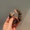 Invierno 2023 nuevo color Maillard pequeña fragancia cuadros de lana cristal lazo banda para el pelo cuerda para el pelo de alta calidad