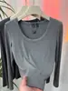 Camiseta Versátil de Manga Larga con Cuello en U y Canalé Suave Estilo Minimalista para Mujer Primavera/Otoño 2026 Estilo Coreano Elegante Que Reduce la Edad Top Combinable