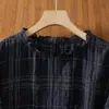 Foto real camisa de manga curta xadrez solta feminina 2026 nova de verão fina proteção solar camisa de temperamento que rejuvenesce top