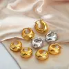 Pendientes de titanio y acero chapados en oro de diseño geométrico de nicho de lujo ligero de alta calidad, nuevos, transfronterizos europeos y americanos, joyería versátil para mujer