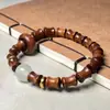 Pulsera de Palosanto Negro Tallado y Bambú con Colgante de Loto DIY Simbolizando Progreso Continuo, Pulsera de Nuevo Diseño Estilo Chino para Mujeres