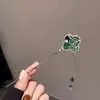 Nueva horquilla con borlas de estilo chino para mujer, estilo antiguo, de metal de alta calidad, horquilla para el cabello con recogido de magnolia, estilo nacional, estilo cheongsam frío, paso sacudida