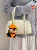 Bolso de Punto Calado de Diseño de Nicho para Mujer 2026 Nuevo Verano Estilo Coreano Versátil Bolso Tejido Hecho a Mano Bolso de Cubo de Mano
