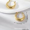Pendientes de acero inoxidable pequeños, frescos y huecos, de moda, con diseño de luna llena, populares e informales, de gran venta entre Europa y Estados Unidos.