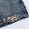 Ropa de mujer transfronteriza al por mayor estilo europeo y americano 2026 primavera nueva moda shorts versátiles de mezclilla rotos con cinturón