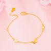 Pulsera de oro de 24k de imitación mariposa versión coreana de dulces niñas Net Red vivo arena oro suministro fabricantes una generación de cabello