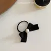 Será uma tiara de pérolas com laço de alta taxa de uso ~ elástico para cabelo Corda de cabelo Coreia do Sul ins adorno de cabeça preto Estilo francês