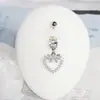 Bestseller transfronterizo: Piercing de ombligo con forma de corazón y lazo, con anillo incrustado de diamantes, adorno de ombligo de aleación de titanio de acero inoxidable