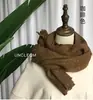 Venta de liquidación de bufandas con 40% de descuento en un puesto, bufandas largas y cortas de hilo de felpa tejido cálido para otoño e invierno en oferta